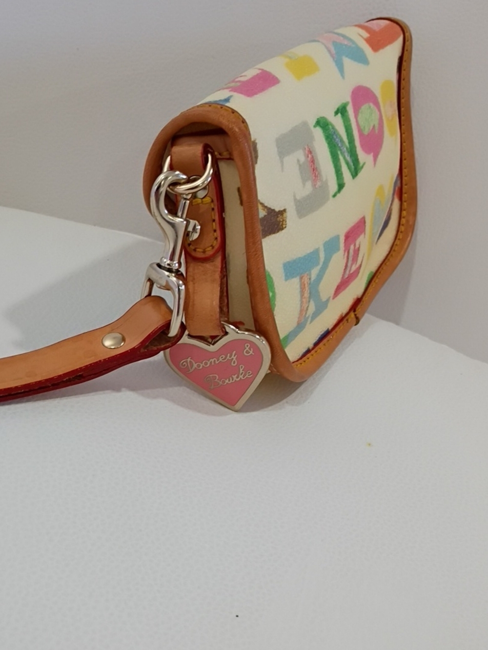 Dooney & Bourke VintageMulticolor Logo Wristlet - White Background with Tan Trim - Picture 3 of 6